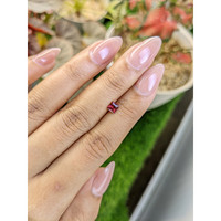 0.49 Ct. Purplish Red Rhodolite Garnet from Ceylon (Sri Lanka) Life Style
