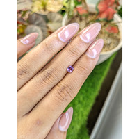 0.51 Ct. Pinkish Purple Rhodolite Garnet from Ceylon (Sri Lanka) Life Style