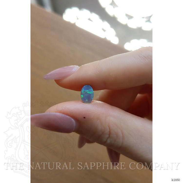 0.93 Ct. Cabochon Semi-Black Opal from Australia
