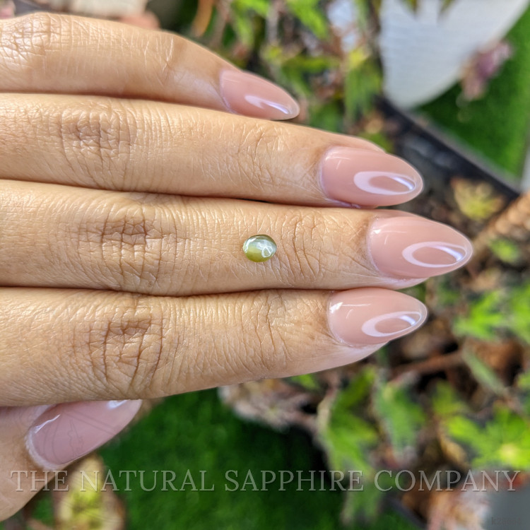 0.52 Ct. Yellowish Green Cabochon Chrysoberyl from Ceylon (Sri Lanka)