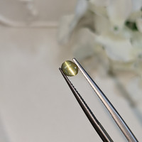 0.52 Ct. Yellowish Green Cabochon Chrysoberyl from Ceylon (Sri Lanka) Life Style