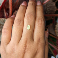 0.83 Ct. Yellowish Green Cabochon Chrysoberyl from Ceylon (Sri Lanka) Life Style