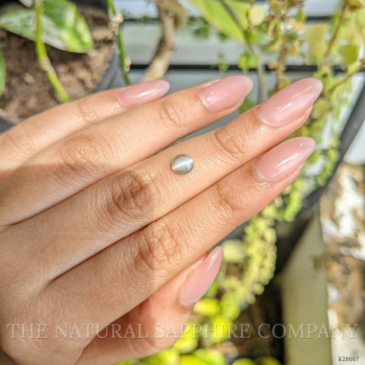 0.82 Ct. Yellowish Green Cabochon Chrysoberyl from Ceylon (Sri Lanka)