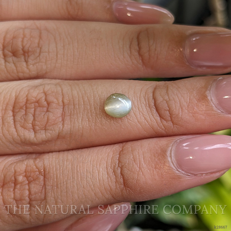 0.82 Ct. Yellowish Green Cabochon Chrysoberyl from Ceylon (Sri Lanka)