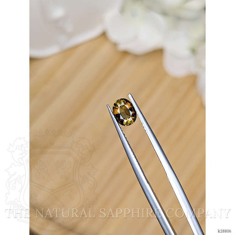 0.65 Ct. Yellowish Brown Zircon from Ceylon (Sri Lanka)