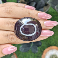 153.56 Ct. Pinkish Purple Star Garnet from Ceylon (Sri Lanka) Life Style