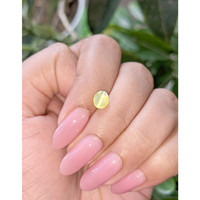 1.35 Ct. Greenish Yellow Cabochon Chrysoberyl from Tanzania Life Style