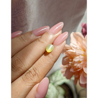 1.63 Ct. Greenish Yellow Cabochon Chrysoberyl from Tanzania Life Style