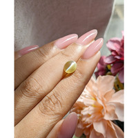 1.76 Ct. Greenish Yellow Cabochon Chrysoberyl from Tanzania Life Style