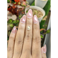 1.36 Ct. Multi Color Cabochon Rutilated Quartz from Brazil Life Style