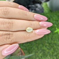 2.05 Ct. Greenish Yellow Cabochon Chrysoberyl from Tanzania Life Style