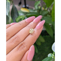 2.05 Ct. Greenish Yellow Cabochon Chrysoberyl from Tanzania Life Style