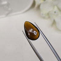 4.09 Ct. Greenish Brown Cabochon Tourmaline from Ceylon (Sri Lanka) Life Style
