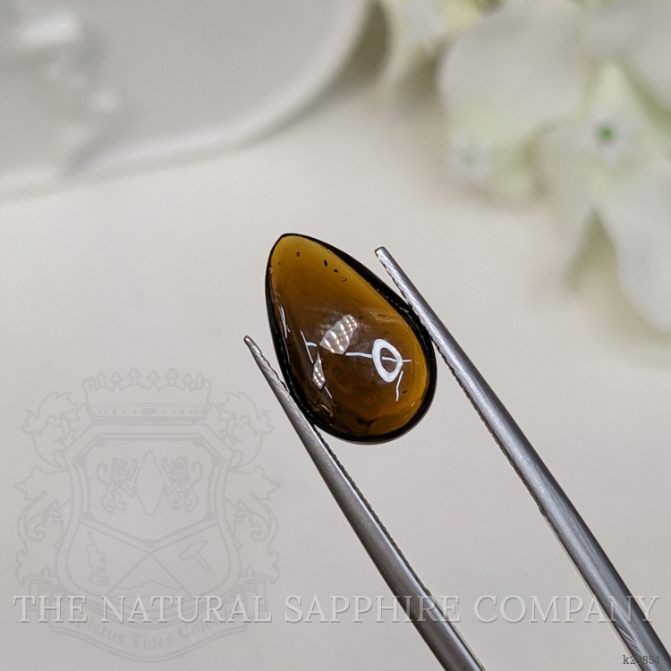 4.09 Ct. Greenish Brown Cabochon Tourmaline from Ceylon (Sri Lanka)