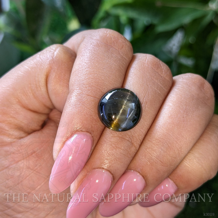 11.54 Ct. Brownish Green Cabochon Chrysoberyl from Ceylon (Sri Lanka)