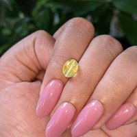 3.70 Ct. Greenish Yellow Cabochon Chrysoberyl from Tanzania Life Style