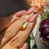 3.70 Ct. Greenish Yellow Cabochon Chrysoberyl from Tanzania Life Style