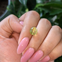 4.18 Ct. Greenish Yellow Cabochon Chrysoberyl from Ceylon (Sri Lanka) Life Style
