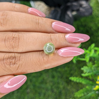 4.52 Ct. Yellowish Green Cabochon Chrysoberyl from Ceylon (Sri Lanka) Life Style