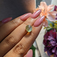 4.52 Ct. Yellowish Green Cabochon Chrysoberyl from Ceylon (Sri Lanka) Life Style