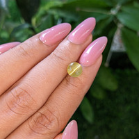 2.62 Ct. Greenish Yellow Cabochon Chrysoberyl from Tanzania Life Style
