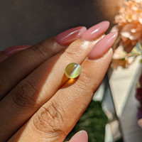 3.33 Ct. Yellowish Green Cabochon Chrysoberyl from Madagascar Life Style