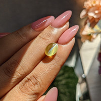 4.55 Ct. Greenish Yellow Cabochon Chrysoberyl from Madagascar Life Style