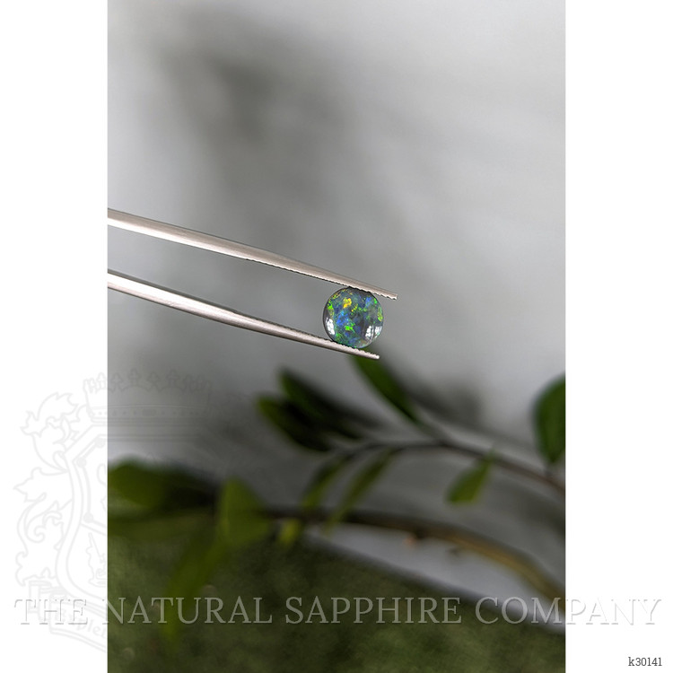 0.62 Ct. Multi Color Cabochon Black Opal (Dark Opal) from Australia