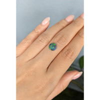 0.62 Ct. Multi Color Cabochon Black Opal (Dark Opal) from Australia Life Style