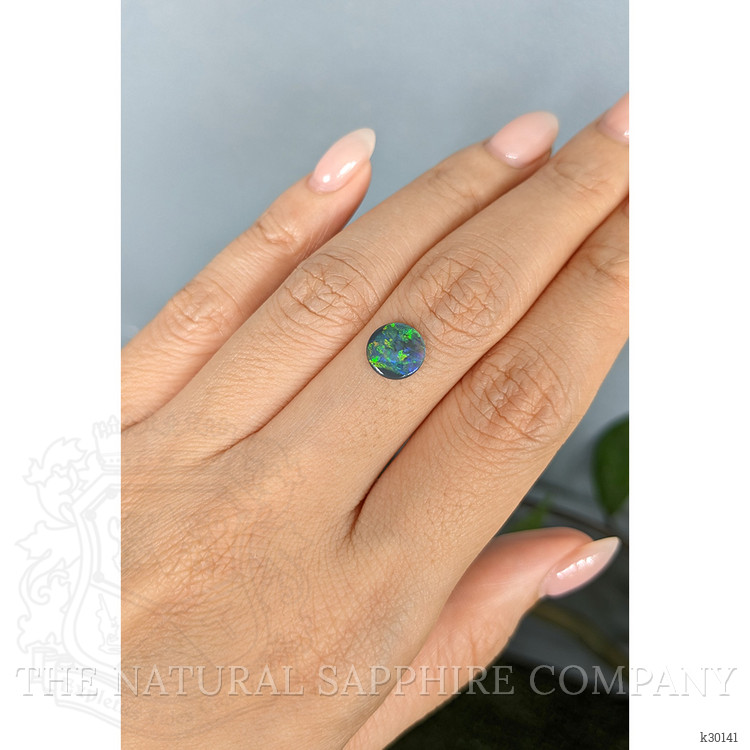 0.62 Ct. Multi Color Cabochon Black Opal (Dark Opal) from Australia