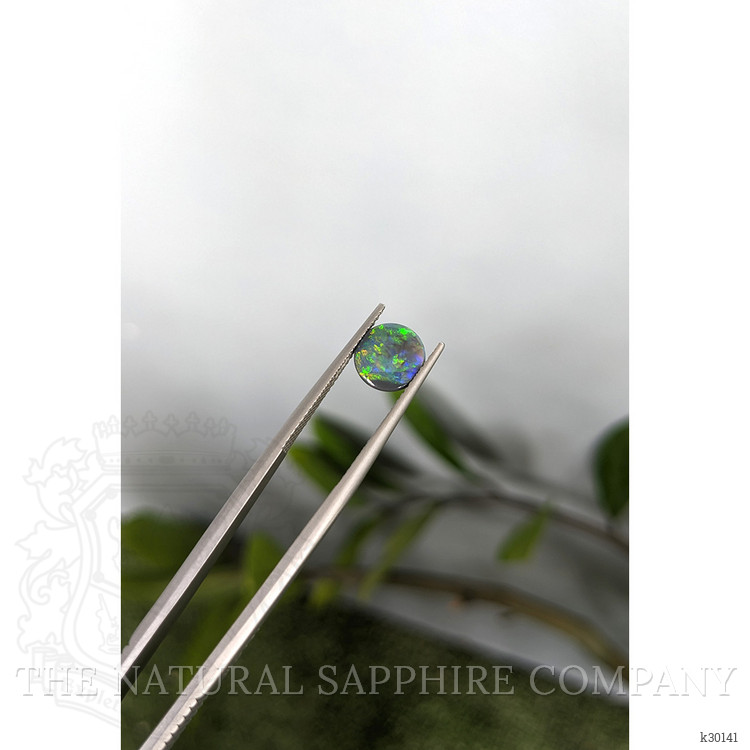 0.62 Ct. Multi Color Cabochon Black Opal (Dark Opal) from Australia