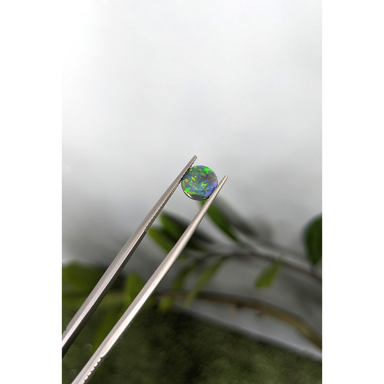 0.62 Ct. Multi Color Cabochon Black Opal (Dark Opal) from Australia