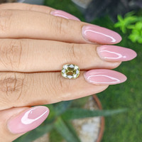 1.68 Ct. Yellowish Green Sinhalite from Ceylon (Sri Lanka) Life Style