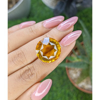 22.65 Ct. Yellowish Orange Citrine from Brazil Life Style