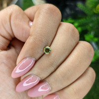 0.32 Ct. Yellowish Green Peridot from Tanzania Life Style