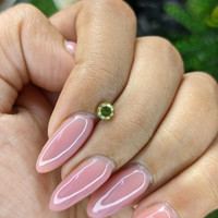 0.33 Ct. Yellowish Green Peridot from Tanzania Life Style