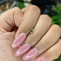 0.27 Ct. Yellowish Green Peridot from Tanzania Life Style