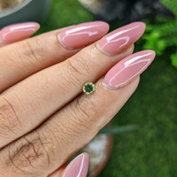 0.25 Ct. Yellowish Green Peridot from Tanzania Life Style