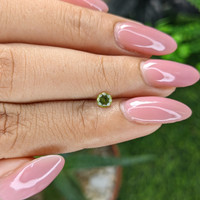 0.25 Ct. Yellowish Green Peridot from Tanzania Life Style