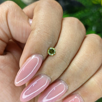 0.25 Ct. Yellowish Green Peridot from Tanzania Life Style