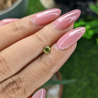 0.28 Ct. Yellowish Green Peridot from Tanzania Life Style