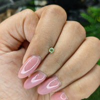 0.10 Ct. Yellowish Green Peridot from Tanzania Life Style