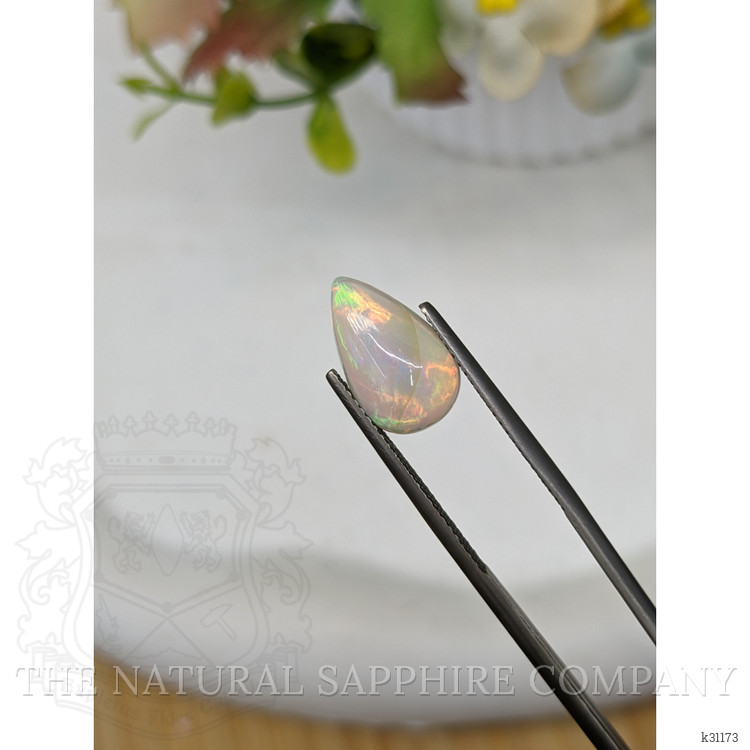 2.34 Ct. Multi Color Cabochon Fire Opal (Flame Opal) from Ethiopia