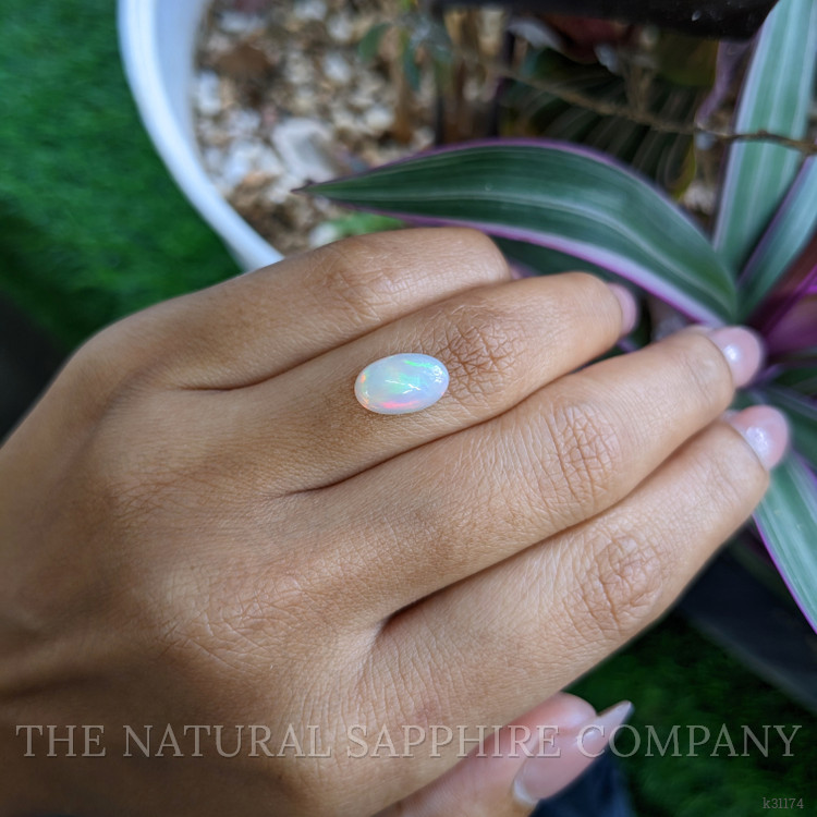 1.55 Ct. Multi Color Cabochon Fire Opal (Flame Opal) from Ethiopia