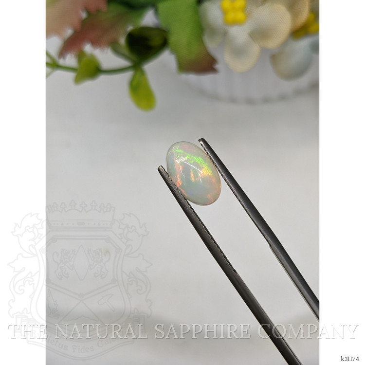 1.55 Ct. Multi Color Cabochon Fire Opal (Flame Opal) from Ethiopia