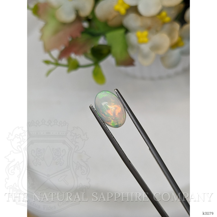 2.21 Ct. Multi Color Cabochon Fire Opal (Flame Opal) from Ethiopia