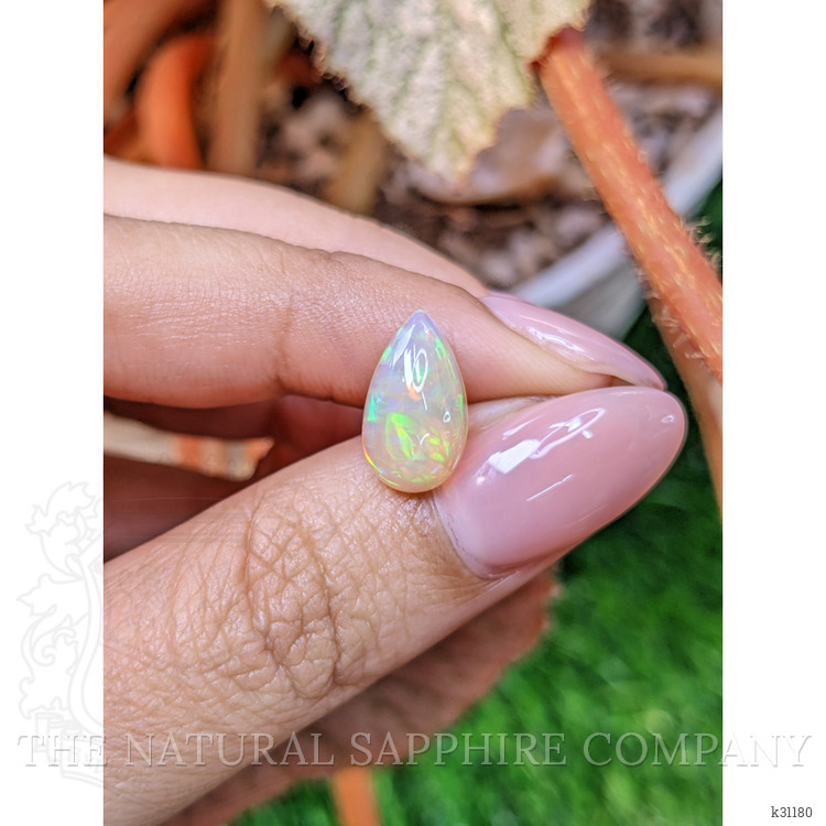 2.38 Ct. Multi Color Cabochon Fire Opal (Flame Opal) from Ethiopia