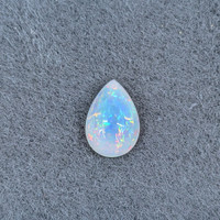 9.87 Ct. Multi Color Cabochon Fire Opal (Flame Opal) from Ethiopia Life Style