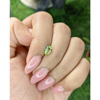 0.60 Ct. Yellowish Green Peridot from Tanzania Life Style