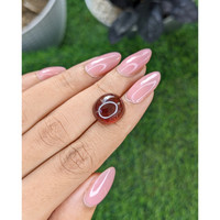 10.37 Ct. Reddish Brown Cabochon Garnet from South Africa Life Style